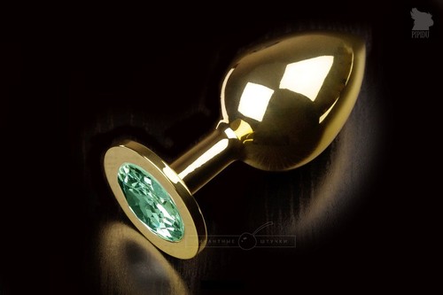 Большая золотая анальная пробка с закругленным кончиком и изумрудным кристаллом - 9 см - Пикантные штучки