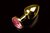 Маленькая золотистая анальная пробка с круглым кончиком и рубиновым кристаллом - 7 см, цвет красный - Пикантные штучки
