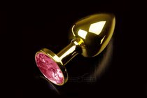 Маленькая золотистая анальная пробка с круглым кончиком и рубиновым кристаллом - 7 см, цвет красный - Пикантные штучки