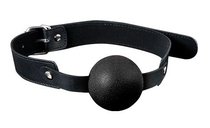 Силиконовый кляп-шар с ремешками из полиуретана Solid Silicone Ball Gag, цвет черный - Blush Novelties