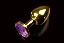 Маленькая золотистая анальная пробка с круглым кончиком и фиолетовым кристаллом - 7 см, цвет фиолетовый - Пикантные штучки